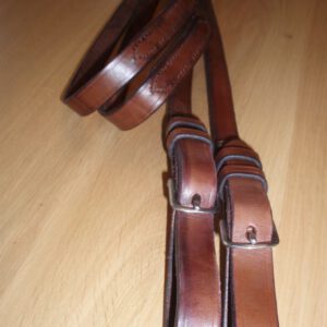 Lederen enkelspan-leidsels met vaste stoten
