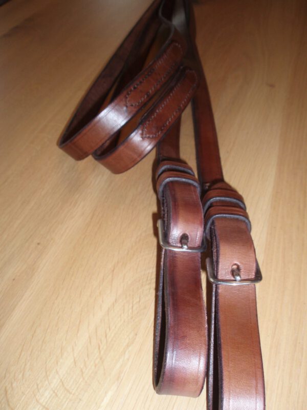 Lederen enkelspan-leidsels met vaste stoten